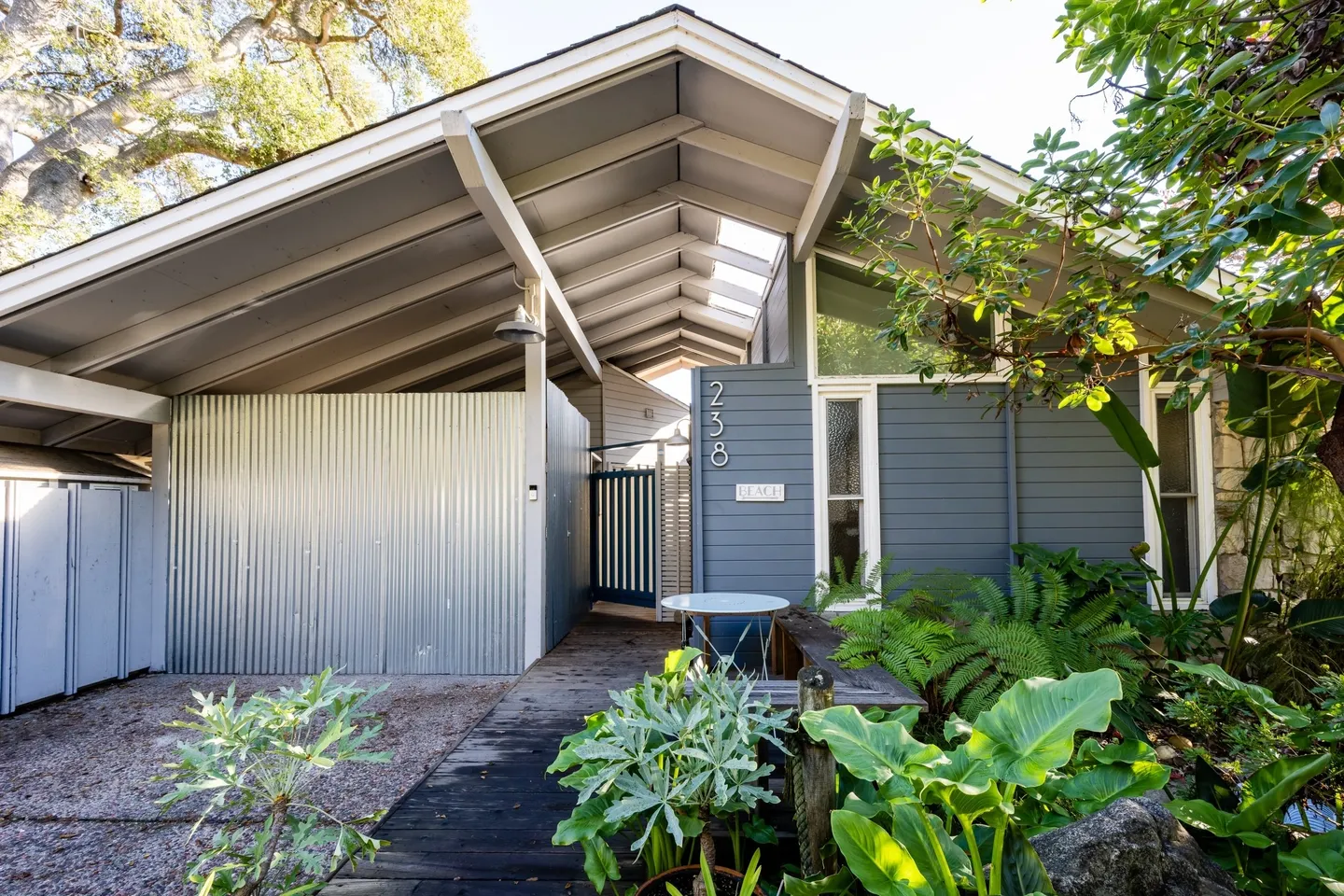 A house with a garden and patio area.